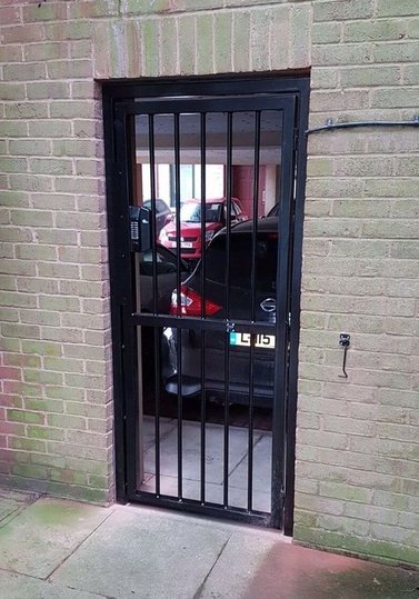 Barred gates with code locks fitted by AJK LOCKS